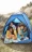 Black family camping on the beach